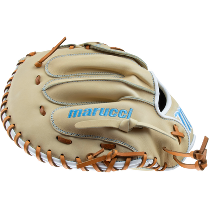 The Marucci Acadia 230C2 33.5" Fastpitch Catcher's Mitt (MFG3AC230C2FP-CM) features tan and brown full-grain cowhide leather, blue stitching, brown laces, white accents, and Marucci branding in blue on the back.