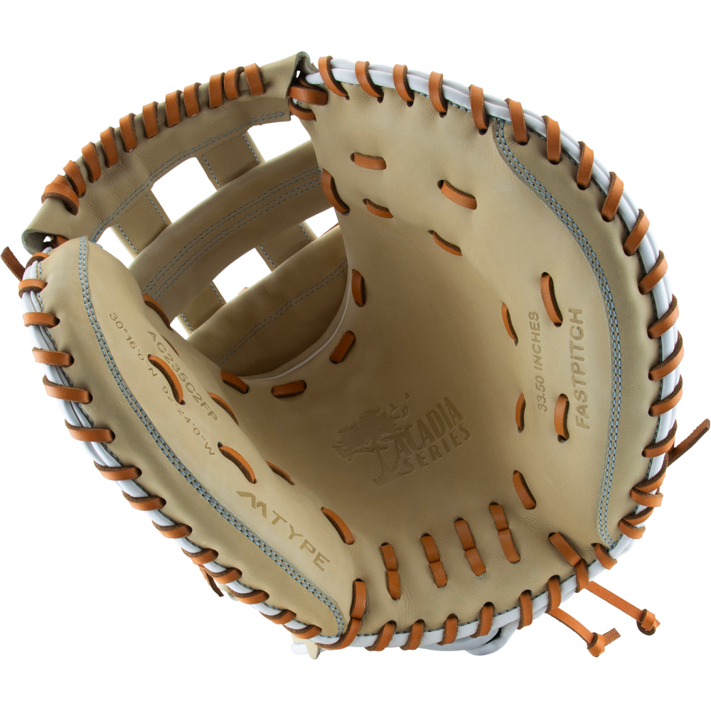 A close-up of an open tan and brown Marucci Acadia 230C2 33.5" Fastpitch Catcher's Mitt (MFG3AC230C2FP-CM), showing the Marucci branding and detailed glove markings stamped on the palm.