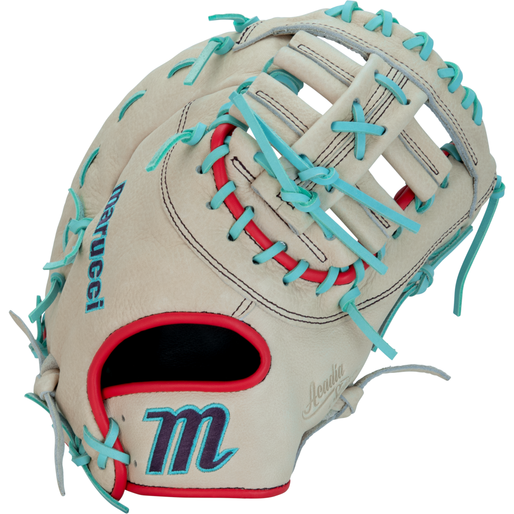The Marucci Acadia 37S1 12.5" First Base Mitt (MFG3AC37S1-CM/R) is cream-colored with blue and red lacing, a partially open web, blue embroidered Marucci branding, and a blue/red M logo near the wrist opening.