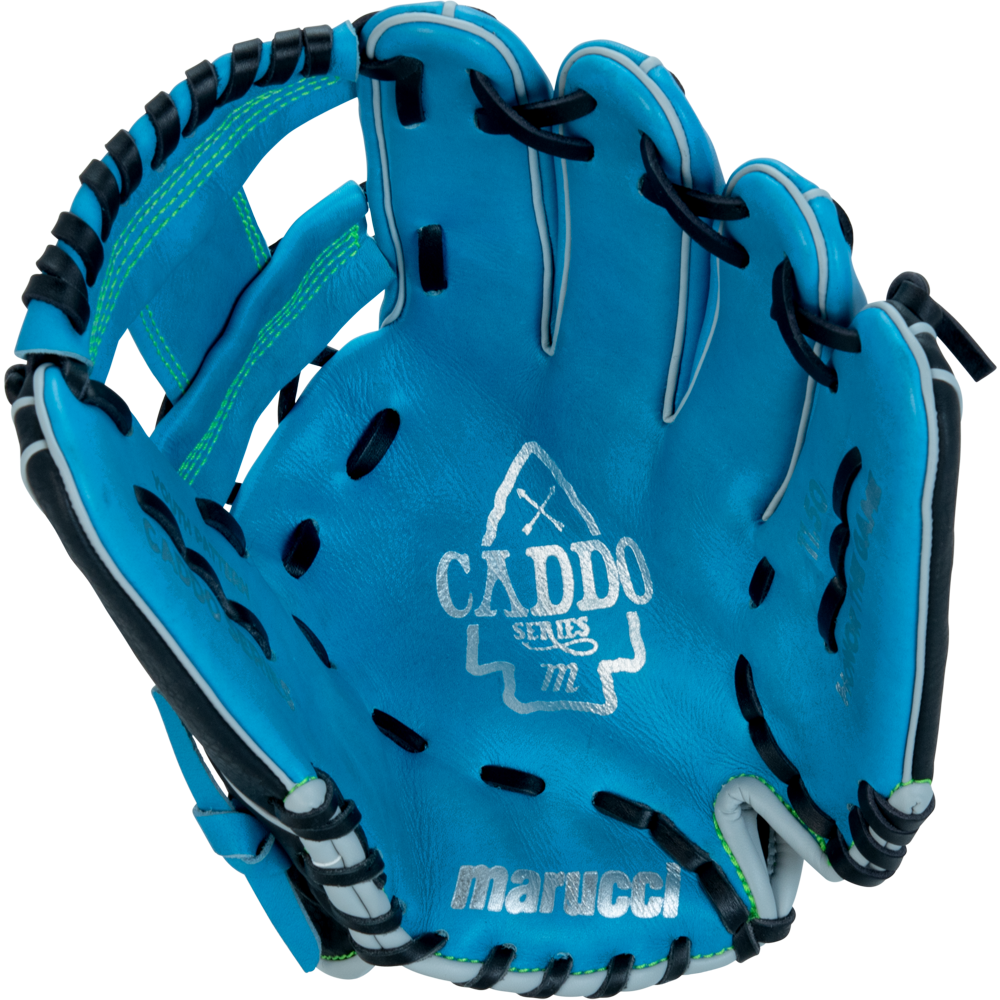 The Marucci Caddo 11.5″ Baseball Glove: MFG3CD115-SB/BK is a youth glove in blue, featuring black laces, green stitching, a silver logo on the palm, and crafted from durable full-grain cowhide leather for an adjustable fit.