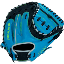 The Marucci Caddo 31" Baseball Catcher's Mitt (MFG3CD310-SB/BK) features a turquoise and black design, white and blue laces, green stitching, full-grain cowhide leather, and the Marucci brand name on the thumb.