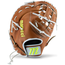 The Marucci Magnolia 39S2 13" Fastpitch First Base Mitt (MFG3MG39S2FP-TF) is a brown glove with white laces, yellow Marucci branding, and crafted from Japanese-tanned steerhide leather, shown upright with the palm and webbing visible.