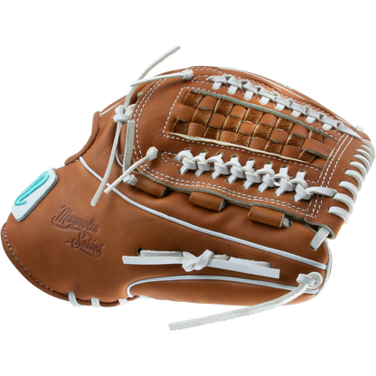 A brown Marucci Magnolia 46K5 12.25" fastpitch glove (MFG3MG46K5FP-TF) features Japanese-tanned steerhide, white stitching and laces, a woven web, and is shown against a plain white background.