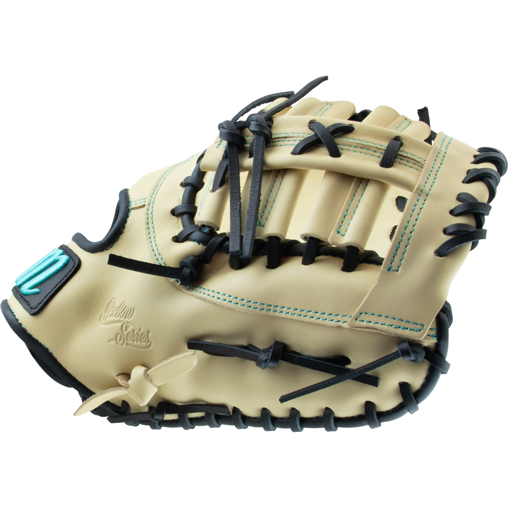 The Marucci Oxbow 38S1 12.75" First Base Mitt features tan full-grain cowhide leather, black pro-grade rawhide laces, teal stitching, an embroidered patch, and "Custom Series" text; shown side view on a white background.
