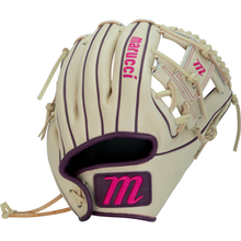 The Marucci Ascension 44A2 11.75″ Fastpitch Glove (MFGASFP44A2-CM/PR) features a beige design with dark brown trim and eye-catching pink Marucci branding, including a pink M logo on the wrist strap. This I-Web infield glove delivers both standout style and high performance for serious players.