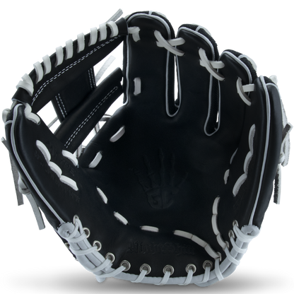The Marucci NightShift CHUCK T 11.5" Baseball Glove (MFGNTSHFT-0103) offers bold black and white style plus top performance, making it ideal for players seeking quality and flair on the diamond.