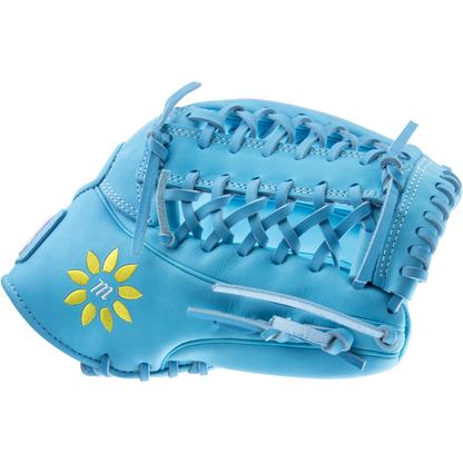 The Marucci NightShift Lorenz 12.5″ Fastpitch Glove: MFGNTSHFT-0305 features light blue Japanese Kip leather, matching lacing, and a yellow sunflower design with a small m at the center.