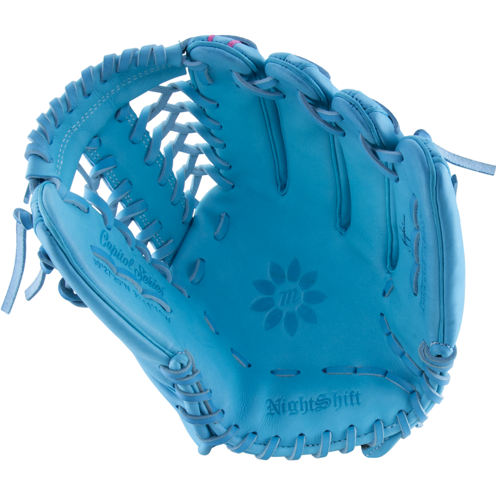 A light blue Marucci NightShift Lorenz 12.5″ Fastpitch Glove: MFGNTSHFT-0305 with dark blue stitching, open and facing up. Made from Japanese Kip leather, it has a floral design and NightShift Signature Series embossed.