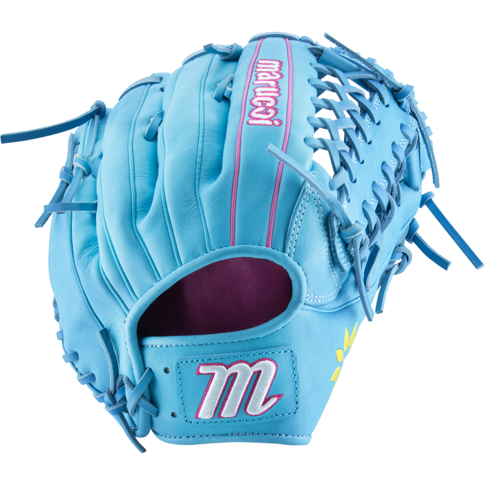 The Marucci NightShift Lorenz 12.5″ Fastpitch Glove: MFGNTSHFT-0305 is light blue Japanese Kip leather with pink/white stitching, marucci, an M on the back, and a yellow sun motif on the thumb.