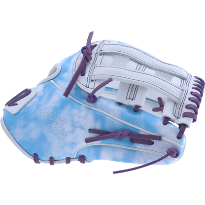 The Marucci NightShift Cloudy 11.75" Baseball Glove (MFGNTSHFT-0402) features Japanese-tanned steerhide with a light blue and white cloud design, white webbing, and purple laces, displayed against a plain white background.
