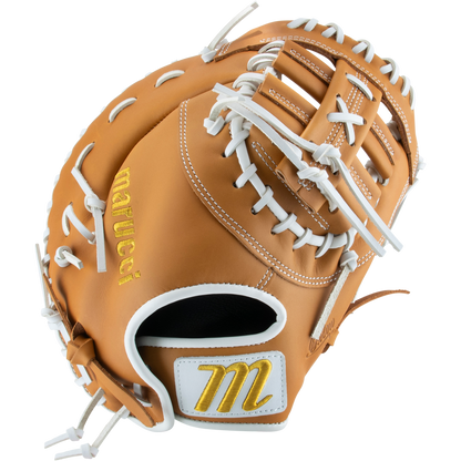 A tan leather Marucci Oxbow 37S1FP 12.5" Fastpitch First Base Mitt (MFGOX37S1FP-TF) with white laces and yellow embroidered accents, including the Marucci name and M logo near the wrist strap. Features a two bar post design, shown on a white background.