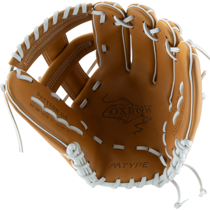 The Marucci Oxbow 44A5FP 11.75" Fastpitch Glove (MFGOX44A5FP-TF) features tan full-grain cowhide leather, white laces, the Oxbow logo and "MTYPE" on the palm, plus open webbing with a braided post design.