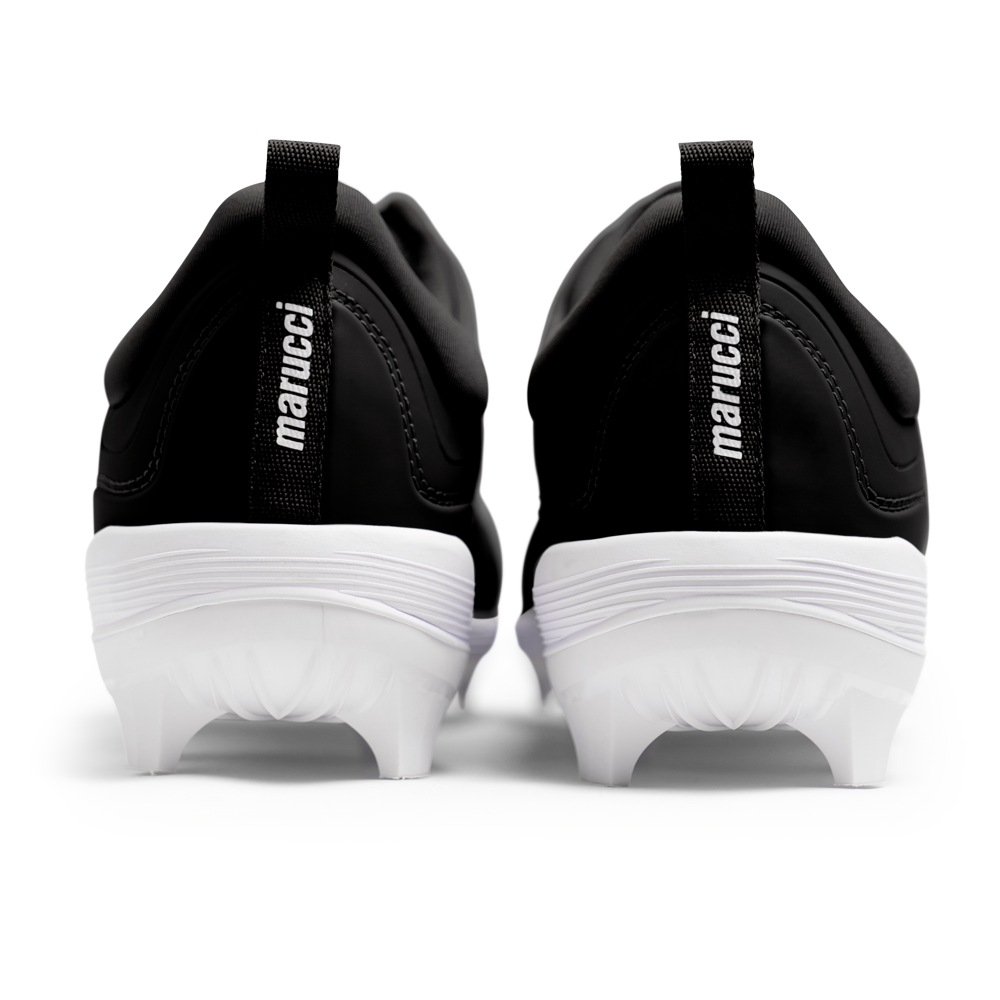 A rear view of two black and white Marucci CFT Low Molded Cleats (MFWCTML) with "marucci" on the pull tabs, set against a white background—ideal low-cut baseball cleats for top performance.