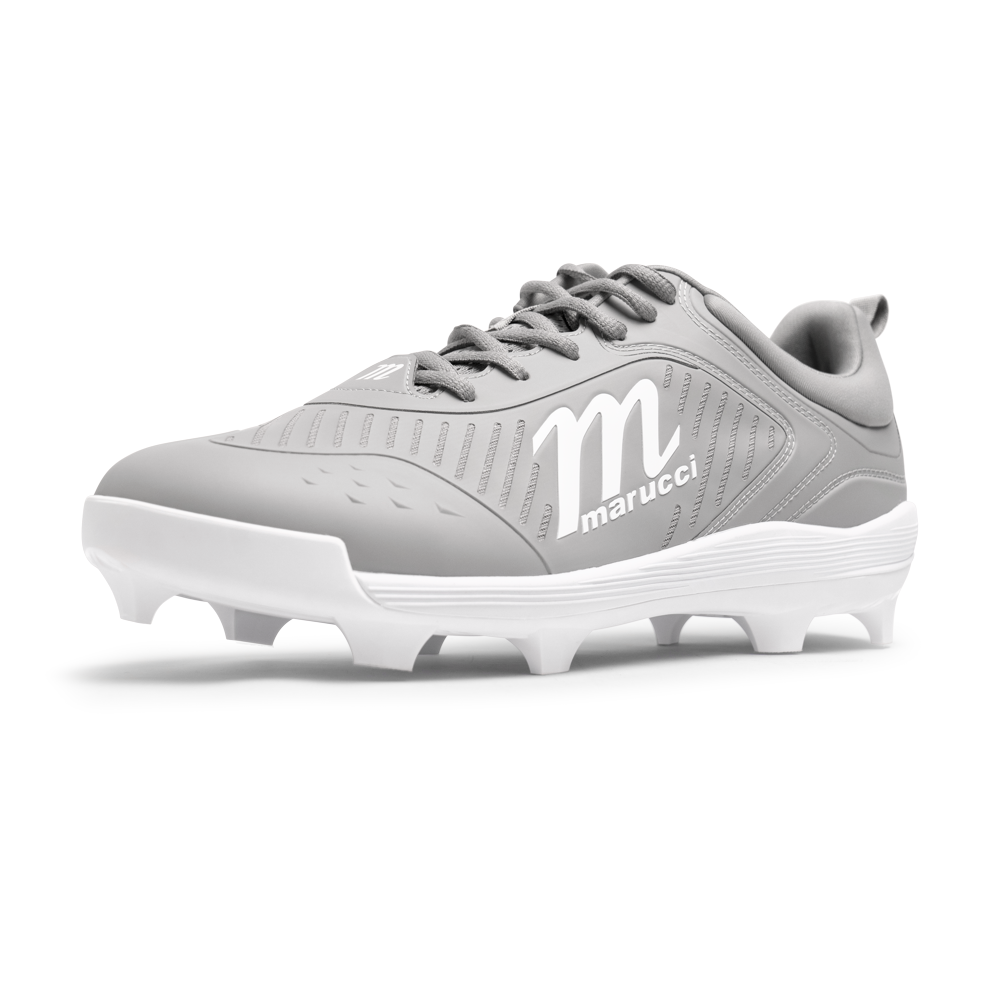 The Marucci CFT Low Molded Cleats: MFWCTML feature a gray and white design with black laces, Marucci logo on the side, and molded studs for great traction and performance on the field.