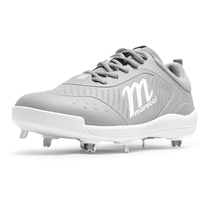 The Marucci CFT Low Metal Cleats: MFWCTSL is a gray baseball shoe with white accents, metal spikes on the sole, and the Marucci logo on the side—perfect athletic footwear for serious players.