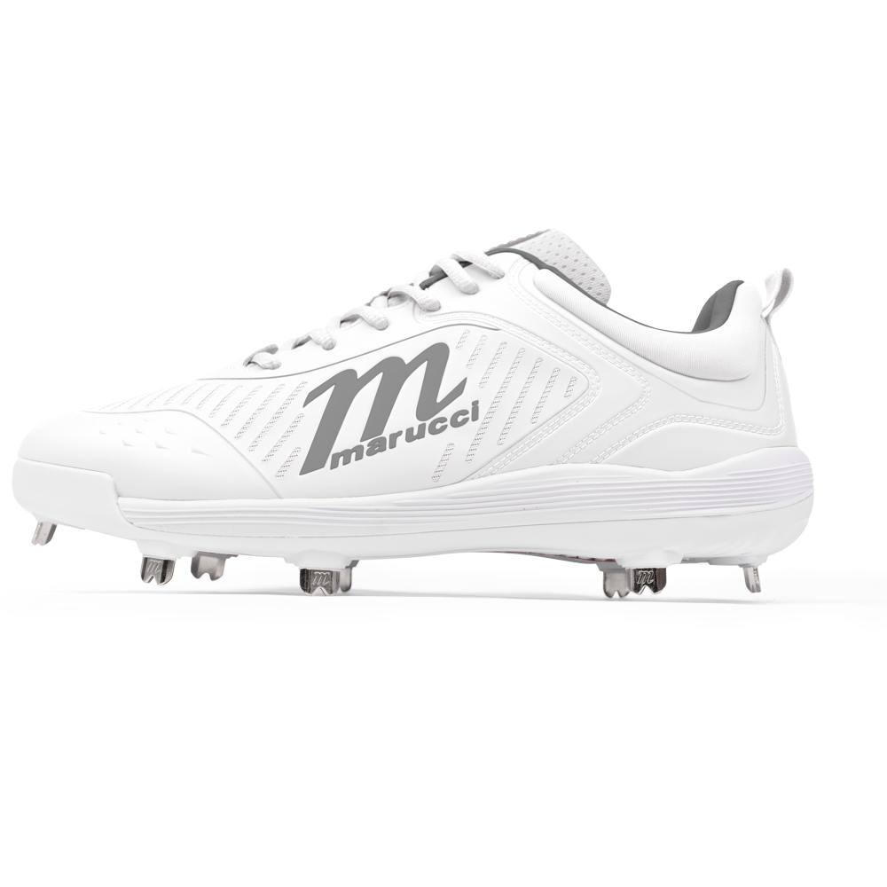 The Marucci CFT Low Metal Cleats (MFWCTSL) feature a white design with silver metal spikes, gray laces, and bold Marucci branding—including a large M logo—perfect for serious athletes seeking premium performance.