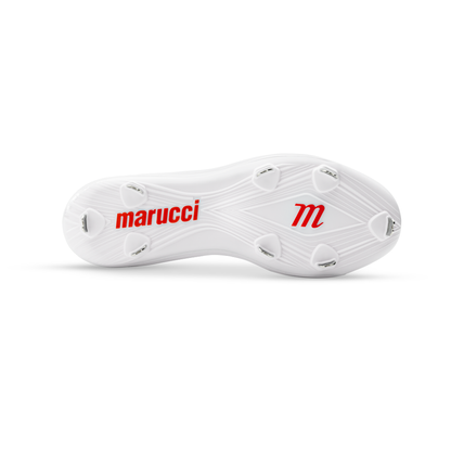The image shows the bottom of a white Marucci CFT Low Metal Cleats: MFWCTSL with six metal spikes. The sole features the "marucci" name and a red "m" logo, both in red.