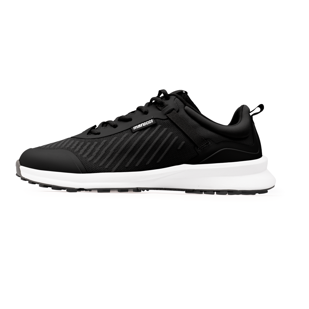The Marucci CFT Turf Shoes (MFWCTT) by Marucci feature a black design with a white sole, black laces, subtle stripes, advanced cushioning for comfort, and a traction rubber outsole. Shown in side view on a plain white background.