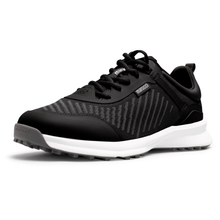 The Marucci CFT Turf Shoes: MFWCTT feature a black textured mesh upper, black laces, and a white cushioned sole with advanced cushioning and a traction rubber outsole, displayed angled on a white background.