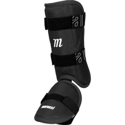 Marucci Batter's Leg Guard (MPLG4) by Marucci, a black adjustable shin and instep protector with removable foot cap, Velcro straps, and white branding for sports or martial arts use, shown on a plain white background.