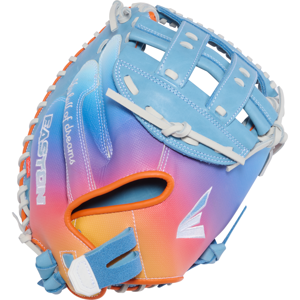 The Easton Jen Schro MYWHY 33" Fastpitch Catcher's Mitt features a vibrant blue, purple, pink, and orange gradient with white laces and blue accents. Crafted from premium Diamond Pro steerhide with "EASTON" and "Field of Dreams" script.
