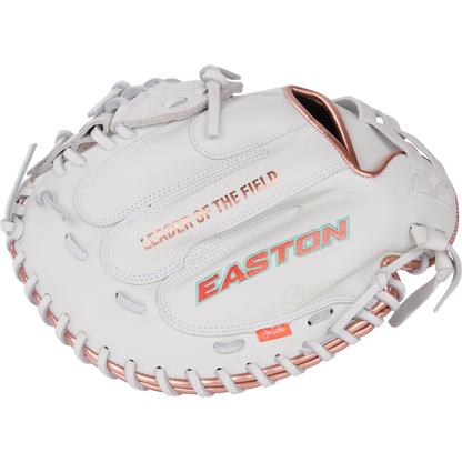 The Easton Jen Schro MYWHY 33" Fastpitch Catcher's Mitt (MYWHY-THENONO) features white and rose gold colors, LEADER OF THE FIELD and EASTON printed on it, detailed stitching, and premium Diamond Pro steerhide leather.