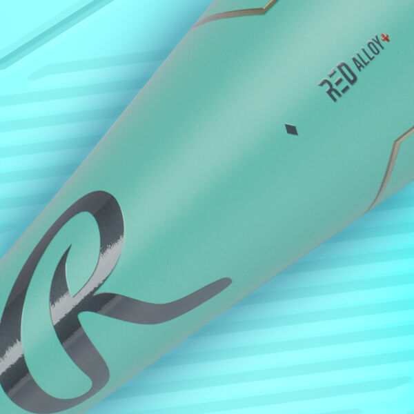 A close-up of a teal baseball bat with the word RED ALLOY printed near the top and a large stylized R logo in black toward the bottom; the background is light blue with diagonal lines.