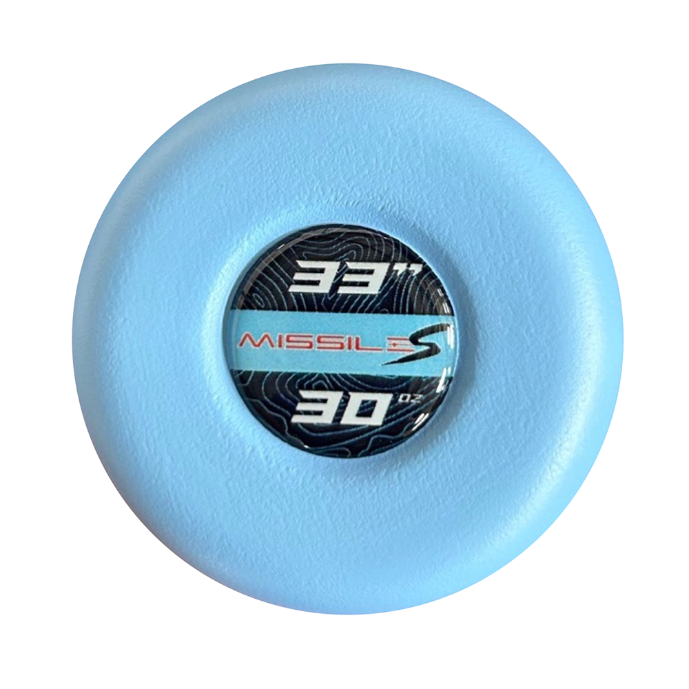 A light blue round disc features a central black label with "331," "MISSILES," "30 OZ," and a stylized S. The subtle wavy line pattern is inspired by the balanced swing weight of the 2024 Stinger Missile S (-3) BBCOR Baseball Bat from Stinger Sports.