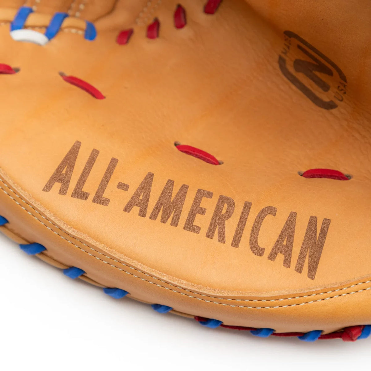 Tan leather Nokona S1 All-American 32″ Baseball Catcher’s Mitt: S1-EP2POP with ALL-AMERICAN embossed on the palm and red and blue lacing.