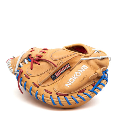Nokona S1 All-American 32″ Baseball Catcher’s Mitt: S1-EP2POP in tan leather with blue, white, and red lacing, featuring a small American flag patch.