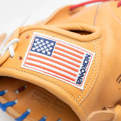 Close-up of a tan leather Nokona S1 All-American 32″ Baseball Catcher’s Mitt: S1-EP2POP featuring a rectangular American flag patch and embossed text that reads Crafted with pride in Nocona, Texas since 1926.
