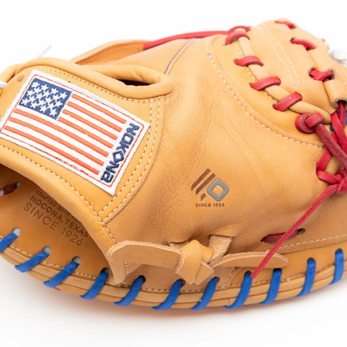 Nokona S1 All-American 32″ Baseball Catcher’s Mitt: S1-EP2POP in tan with a United States flag patch, red lacing at the palm, and blue lacing around the edge.