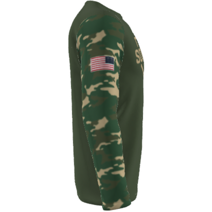 Side view of the DSG Apparel National Softball Association NSA CAMO Sublimated Long Sleeve Shirt featuring green and brown camo sleeves, a U.S. flag patch on the shoulder, and solid dark green moisture-wicking body fabric.