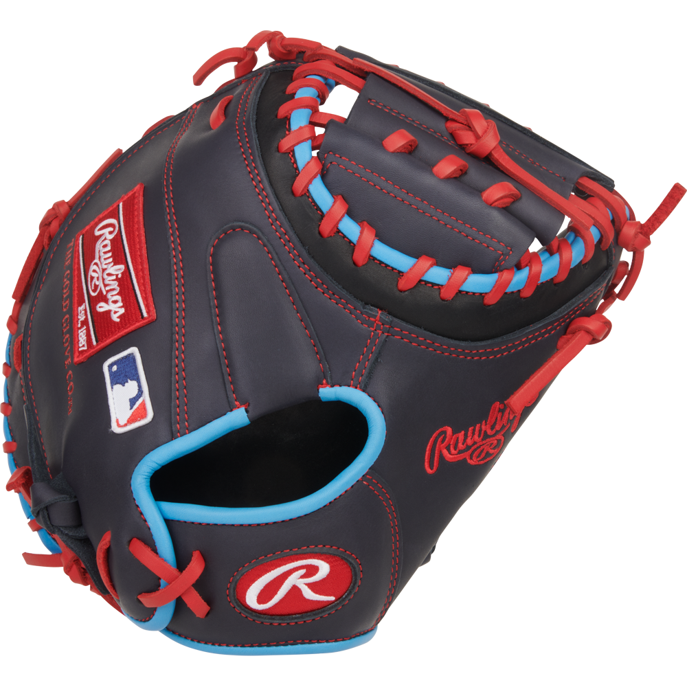 The Rawlings NXT 32.5″ Baseball Catcher’s Mitt (NXTCM325UNG) is crafted from pro-soft black leather with bold red and blue lacing, proudly showcasing both the Rawlings logo and the MLB emblem on the side—an excellent choice for any young catcher seeking a dependable youth mitt.