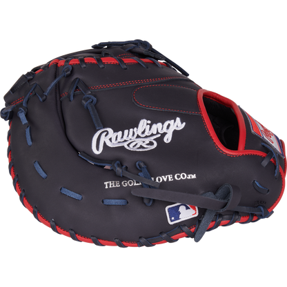 The Rawlings NXT 12.25" Baseball First Base Mitt (NXTDCTU-10N) features dark blue leather with red stitching, Rawlings branding, and an MLB patch—perfect for serious players seeking a top-tier travel ball glove.