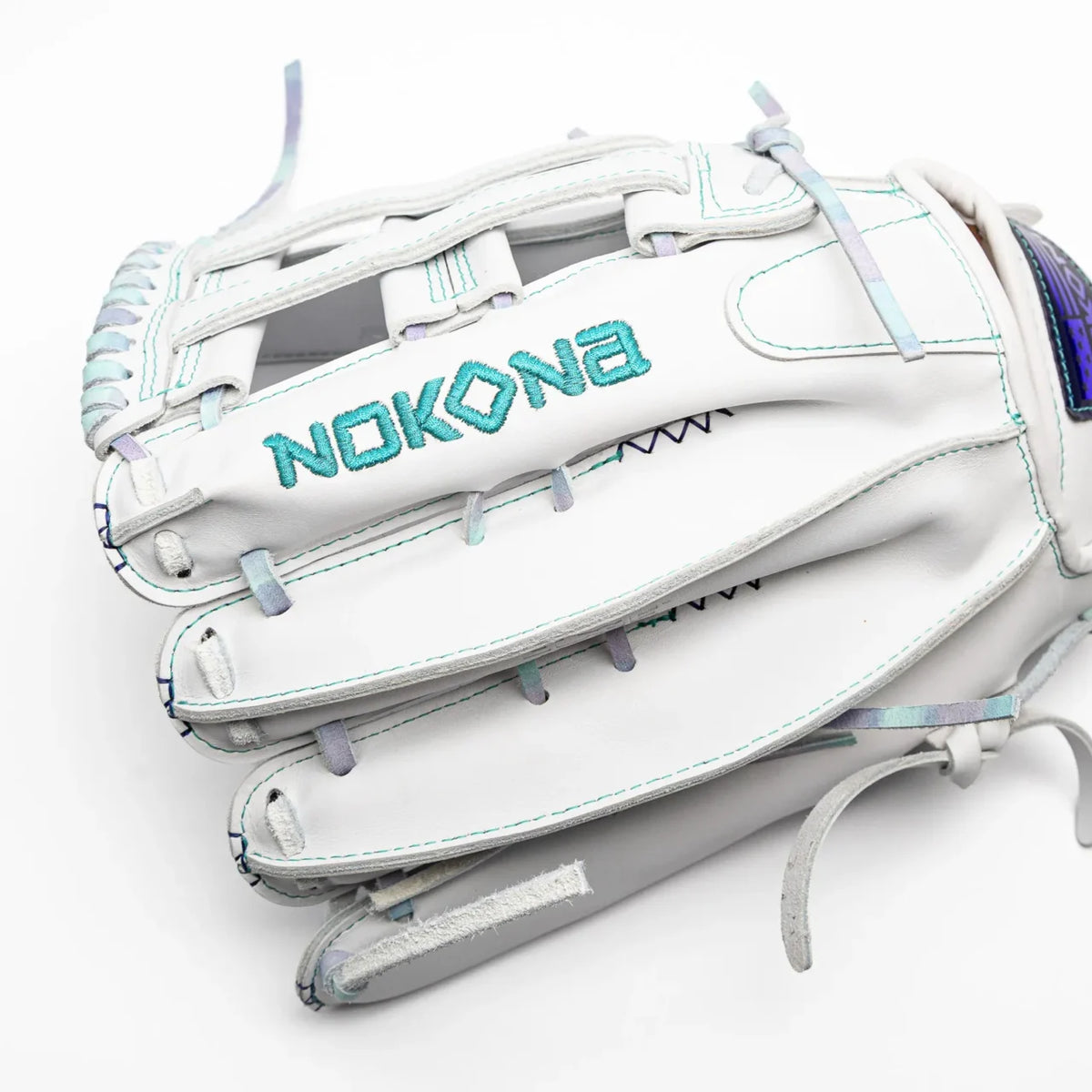 Nokona Halo 12.5″ Fastpitch Glove: WHT-EP1250H in white with teal embroidery, light blue accents, and a holographic patch on the wrist strap.