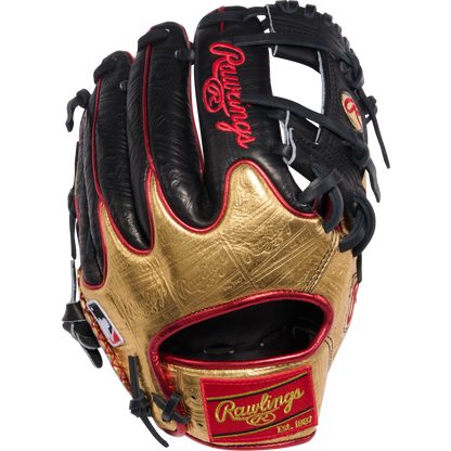 The Rawlings Heart of the Hide 11.5" Baseball Glove (PROGOLDYX, RGGC June 2026) features a black and gold design with red stitching, plus Rawlings logo and Gold Glove Club labels on the wrist strap and thumb.
