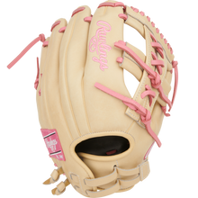 A Rawlings Heart of the Hide 12" Fastpitch Glove (PRO120SB-32CP) in tan with pink laces and pink Rawlings logos, for right-handed throwers, is shown against a white background.