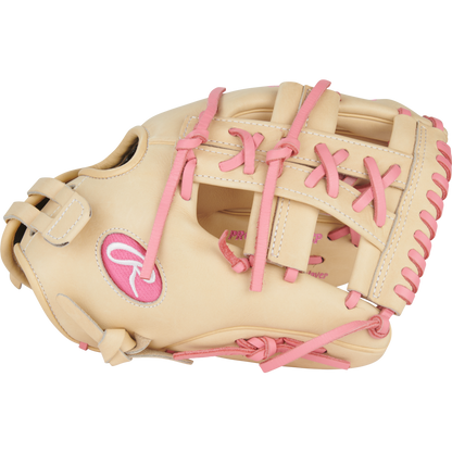 The Rawlings Heart of the Hide 12" Fastpitch Glove (PRO120SB-32CP) features a tan design with pink laces, stitching, and logo—delivering style and performance for fastpitch players.