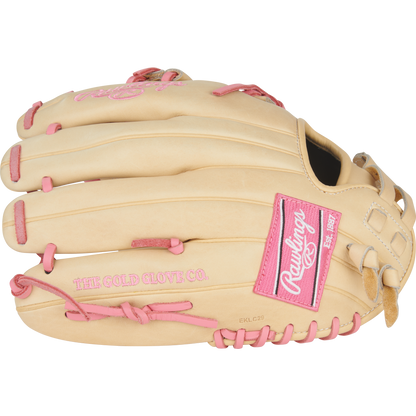 The Rawlings Heart of the Hide 12" Fastpitch Glove (PRO120SB-32CP) features a tan design with pink stitching, pink Rawlings logo patch, and “THE GOLD GLOVE CO.” label—crafted for serious fastpitch players.