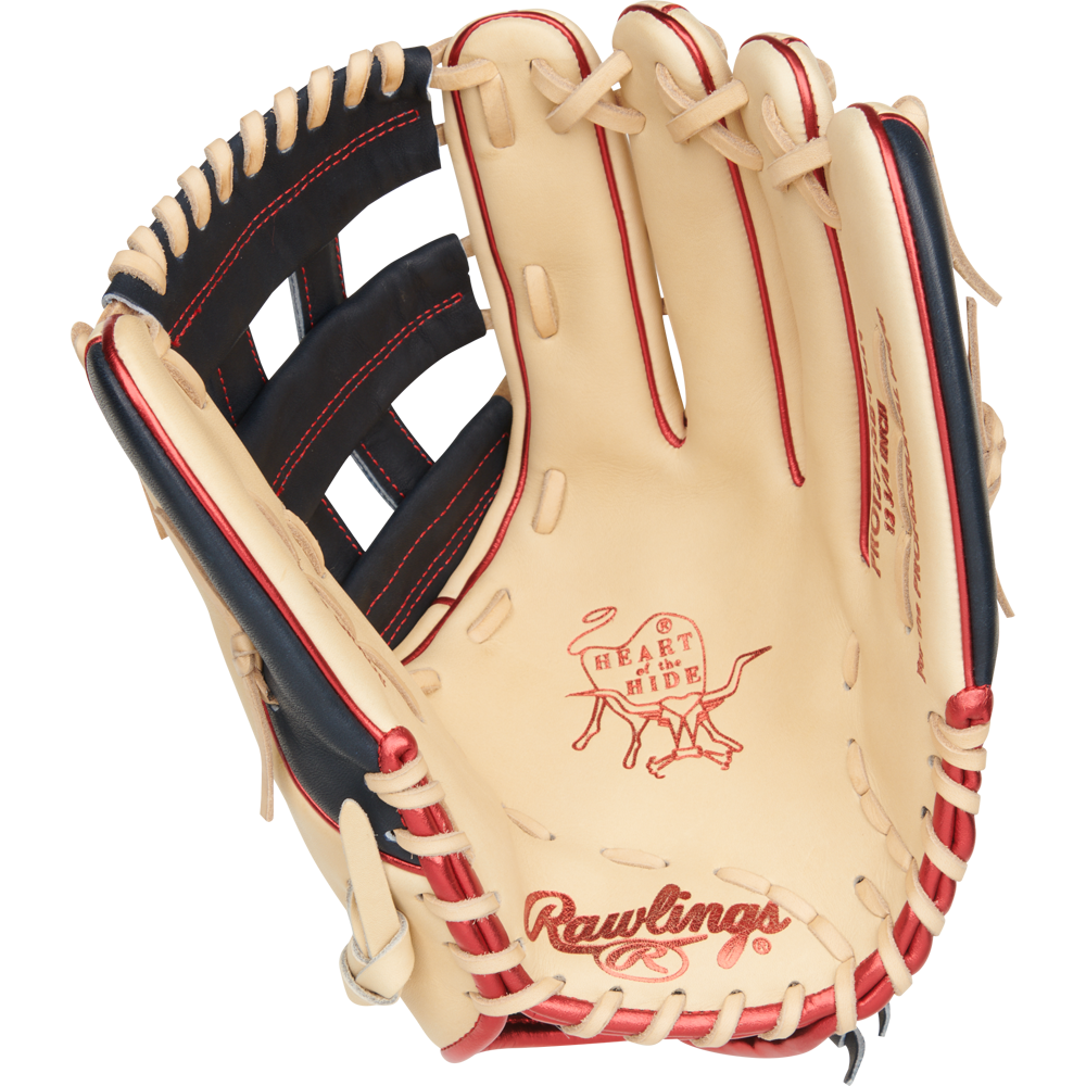 The Rawlings Heart of the Hide 12.75" Fastpitch Glove (PRO1275SB-6CN) is a tan glove with red and black accents, visible stitching on the palm and webbing, and features iconic Heart of the Hide branding.