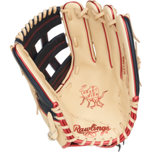 The Rawlings Heart of the Hide 12.75" Fastpitch Glove (PRO1275SB-6CN) is a tan glove with red and black accents, visible stitching on the palm and webbing, and features iconic Heart of the Hide branding.