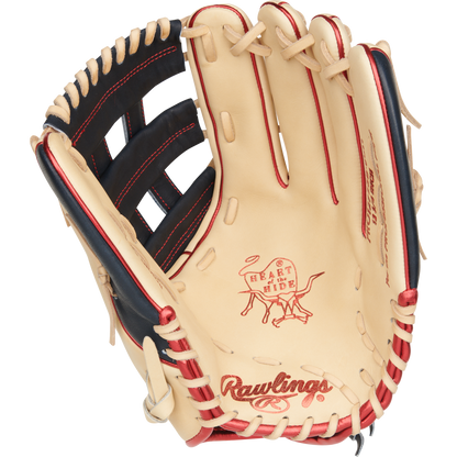The Rawlings Heart of the Hide 12.75" Fastpitch Glove (PRO1275SB-6CN) is a tan glove with red and black accents, visible stitching on the palm and webbing, and features iconic Heart of the Hide branding.