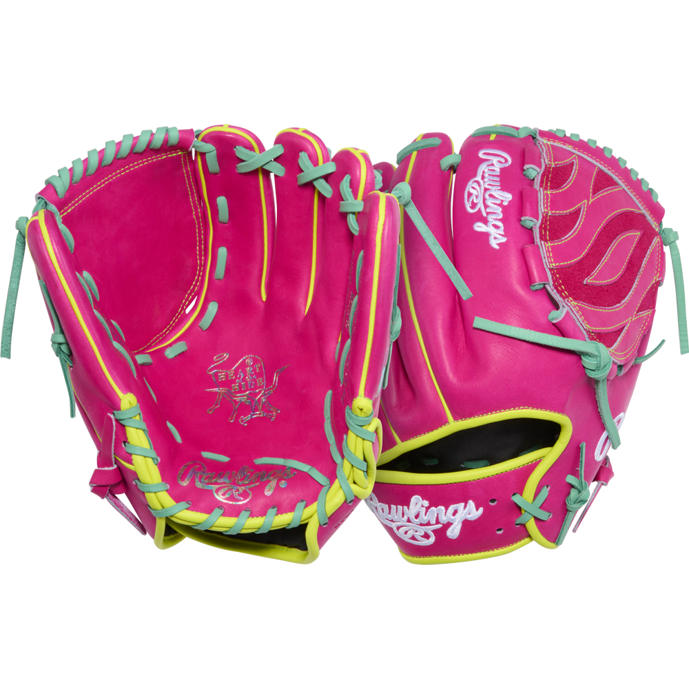 A Rawlings Heart of the Hide 12" Baseball Glove (PRO206TRI-34BE, RGGC January 2026) in bright pink with yellow and teal laces, embroidered logos, and decorative stitching is displayed on a plain white background.