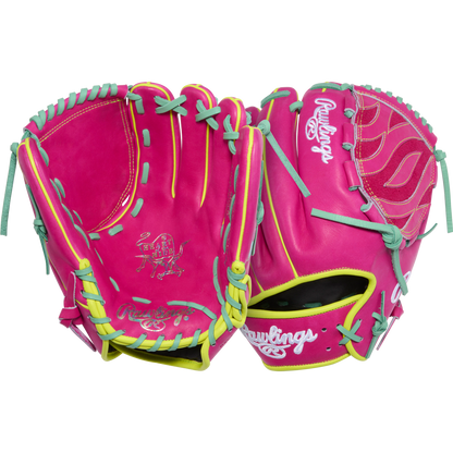 A Rawlings Heart of the Hide 12" Baseball Glove (PRO206TRI-34BE, RGGC January 2026) in bright pink with yellow and teal laces, embroidered logos, and decorative stitching is displayed on a plain white background.