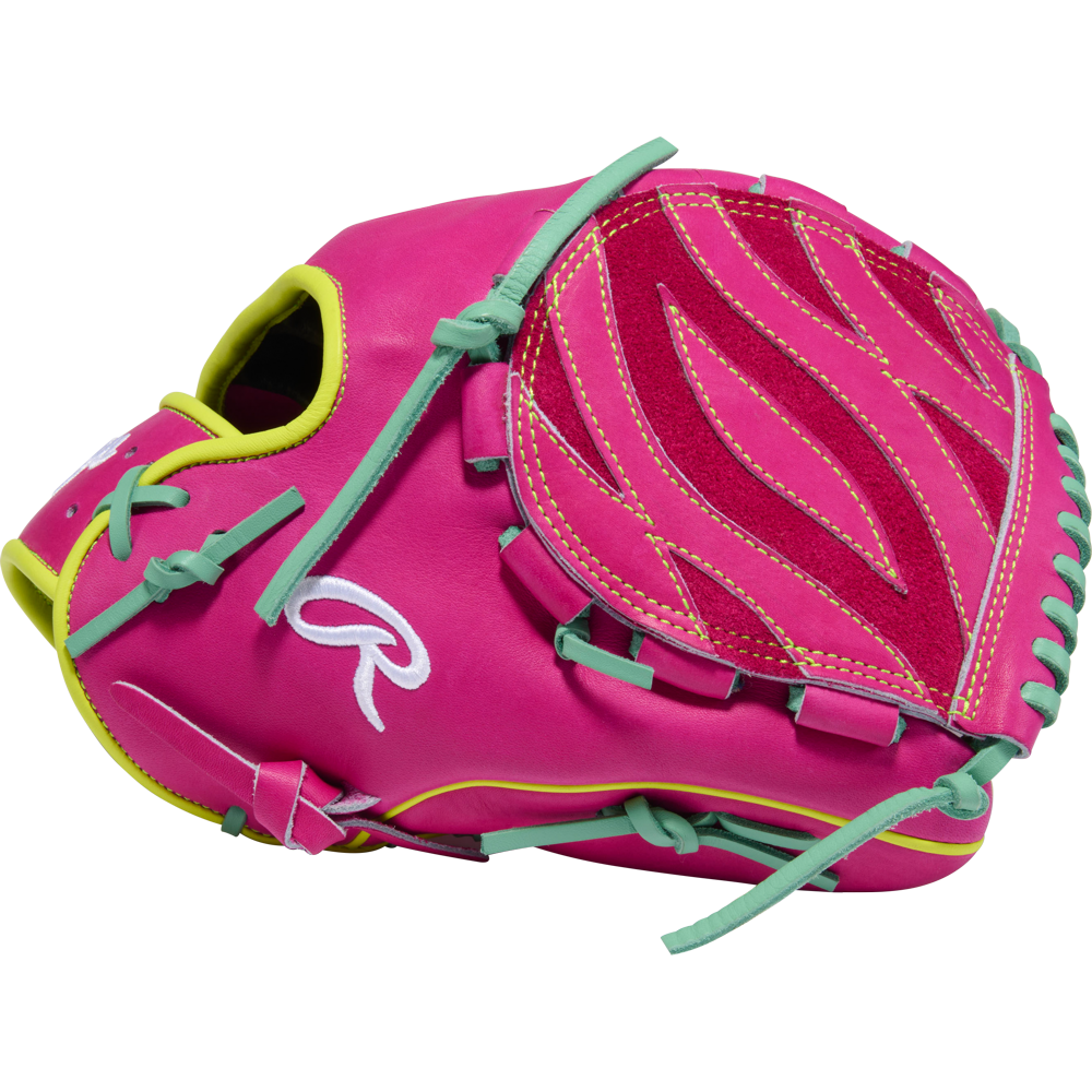 The Rawlings Heart of the Hide 12" Baseball Glove (PRO206TRI-34BE) features a bright pink design with green laces, yellow trim, and decorative stitching, shown on a white background.