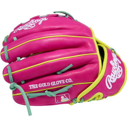 The Rawlings Heart of the Hide 12" Baseball Glove (PRO206TRI-34BE) features bright pink leather with yellow trim, teal laces, white branding, THE GOLD GLOVE CO. text, and the MLB logo—perfect for pitchers.