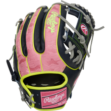 The Rawlings Heart of the Hide 11.75" Baseball Glove (PRO315-2NPY) features a stylish pink and black design, delivering top performance and durability for infielders on the diamond.