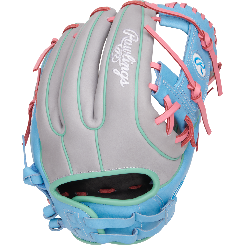 The Rawlings Heart of the Hide 12" Fastpitch Glove (PRO716SB-2GCB) features gray, blue, and teal leather with pink laces and accents. The Rawlings logo appears on the back and thumb—ideal for fastpitch softball.