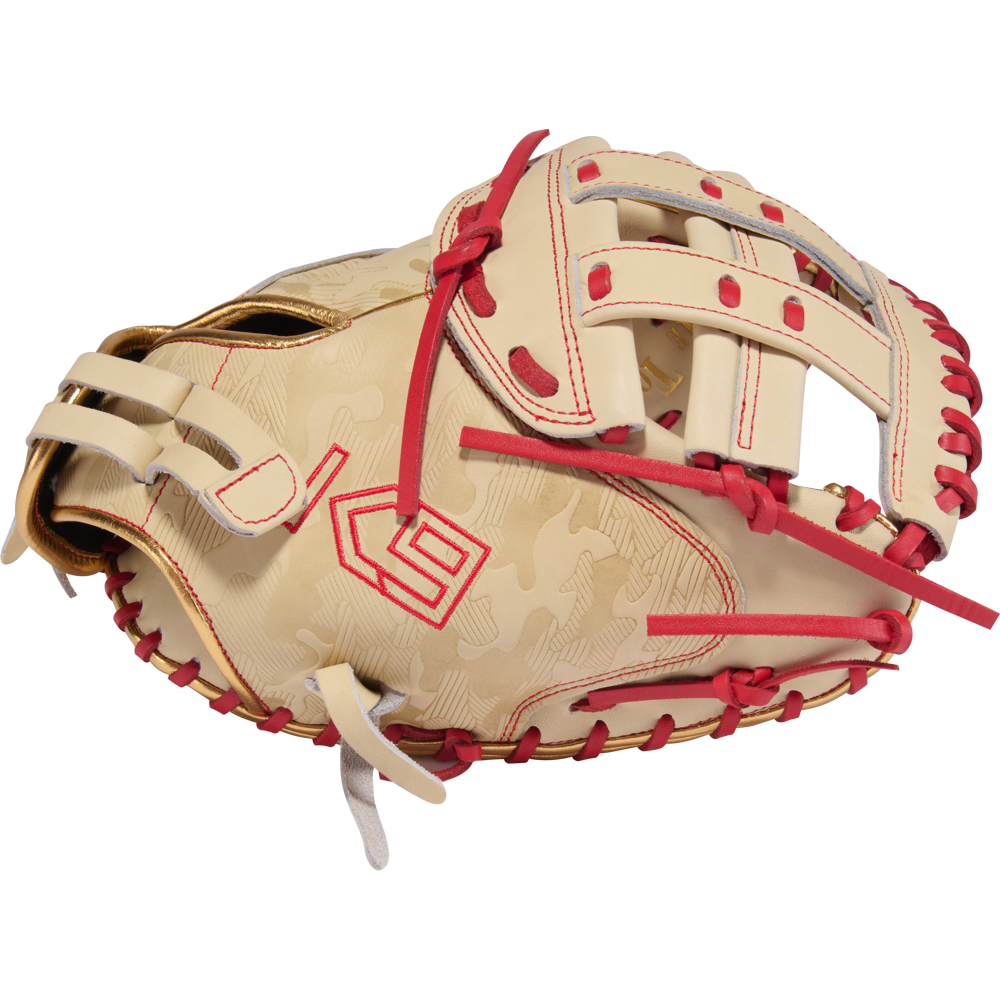 The Rawlings Heart of the Hide 33" Kinzie Hansen K9 Fastpitch Catcher's Mitt (PROCM33FP-24CS) features tan and red leather, red stitching and laces, a bold red logo, and unique patterns inspired by classic catcher's mitts.